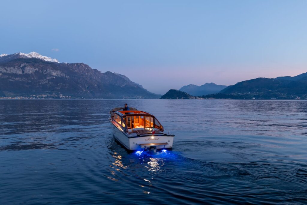 Classic venetian boat on Lake Como Sunset tourLH1
